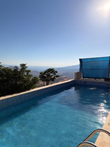 Suwailih Ski Chalet | Luxury Mountain Chalet with Private Pool Lionden Jerash