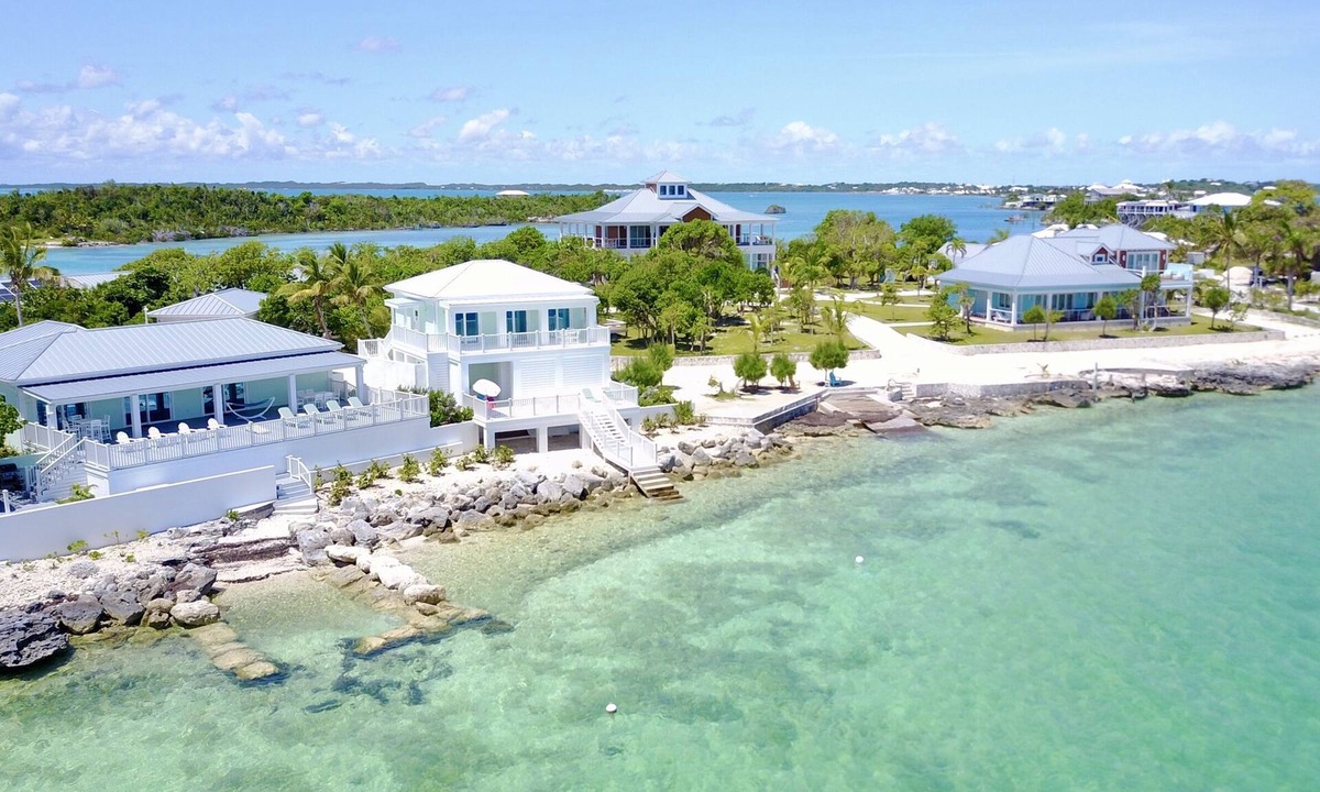 Lubbers Quarters Cay House | Luxury oceanfront 4BR · 2 protected docks · private gated compound