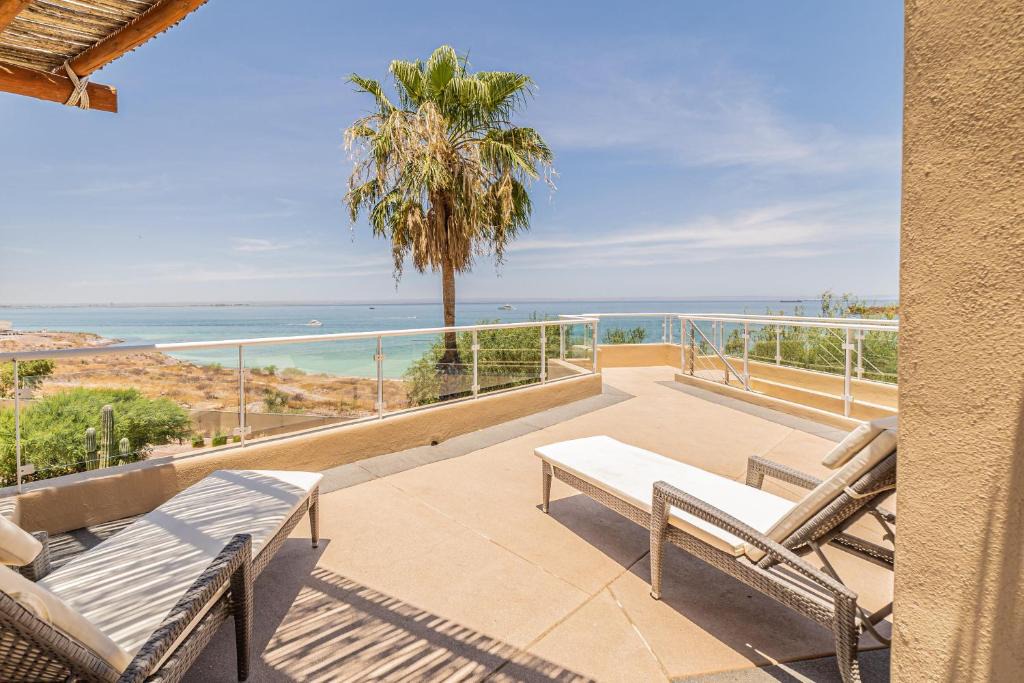 La Paz Villa | Luxury Oceanfront Villa 7 at Puerta Cortes Resort with Beach Club, Jacuzzi & Golf Cart