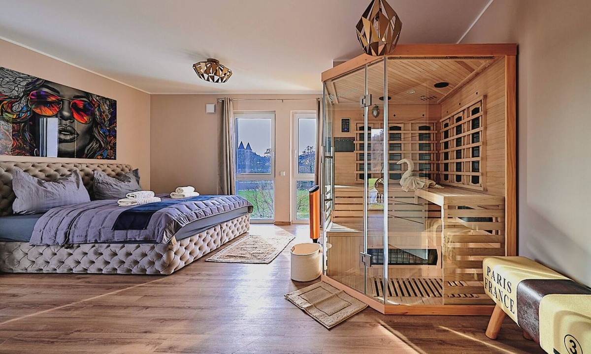 Echternacherbruck Apartment | Luxury suite with infrared sauna, electric fireplace & panoramic abbey view