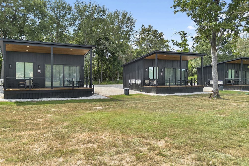 Waller Cabin | Luxury Tiny Home Retreat with Pool, Goats & Pond near Houston in Hempstead, Texas