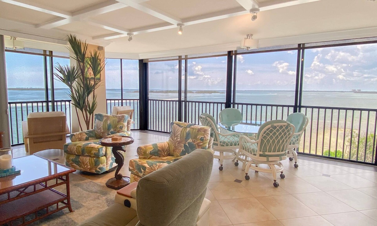 Punta Rassa Apartment | Luxury Water View! Experience Sanibel Harbour Tower 517 with wrap around Balcony!