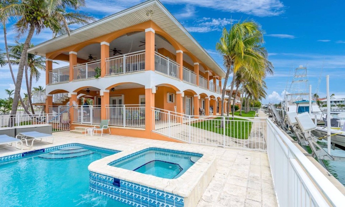 Key Colony Beach House | Luxury Waterfront Key Colony, Pet-Friendly, Pool, Hot Tub, Deepwater 150 ft Dock