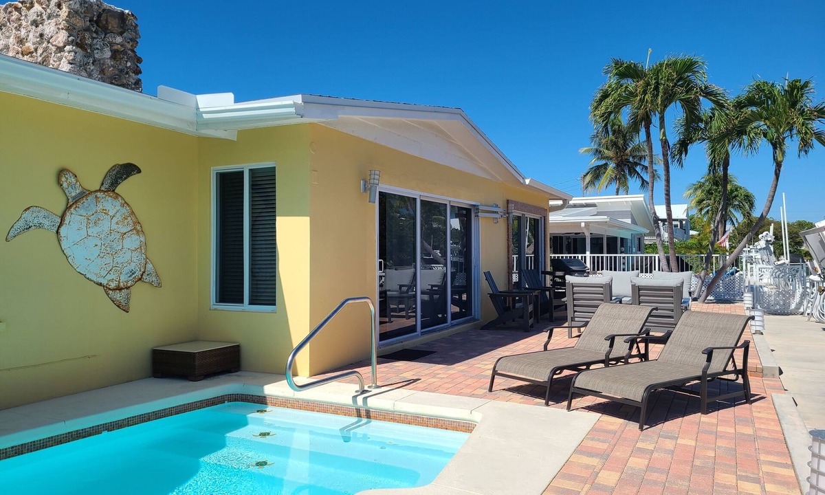 Marathon House | Luxury Waterfront Pool Home Canal Front Direct Ocean Access Fisherman's Paradise