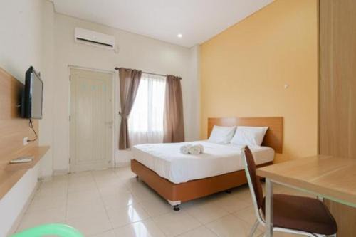 Kuningan House | Mango Suites