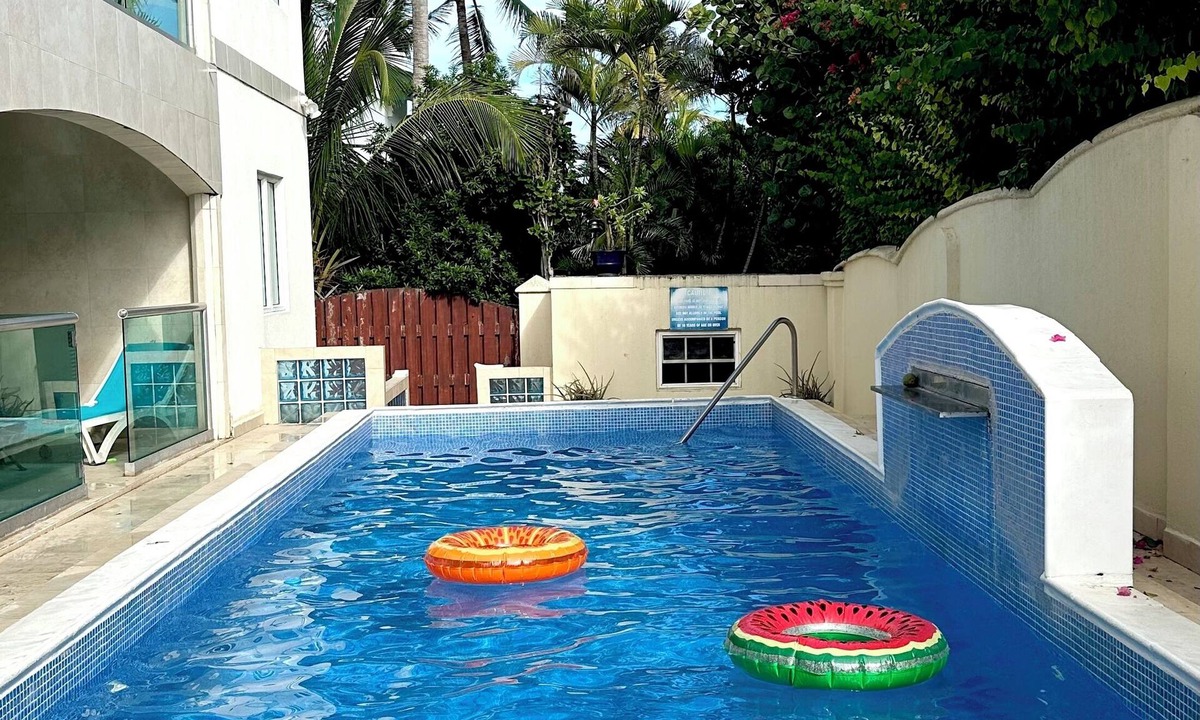 Green Garden Villa | Marvelous 3-bedroom Apartment in Villa, Beautiful Pool, Steps from Surf & Ocean
