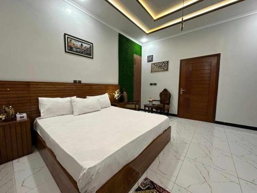 Gulshan-e-Iqbal Hotel | Meadows Hotel and Suites Gulshan