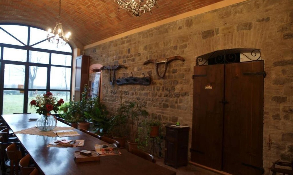 Scandiano Apartment | Melissa apartment, with exposed stone walls, inside a farmhouse