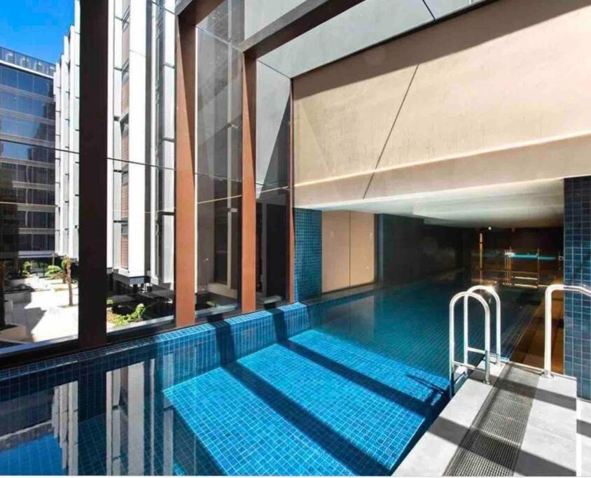 Braddon Apartment | Midnight Luxe 2BR 2Bath Apartment 408 in the heart of Braddon Pool Sauna L4 Views Secure Parking Wine WiFi