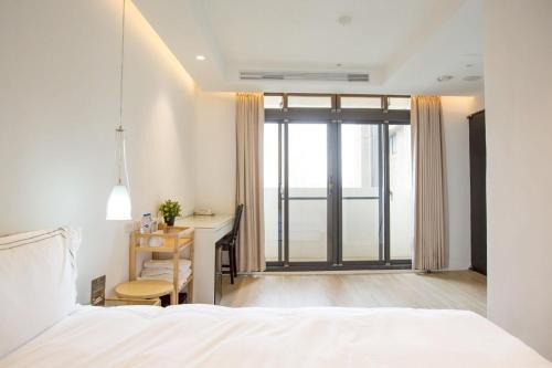 West District Hostel | Mini West Hotel