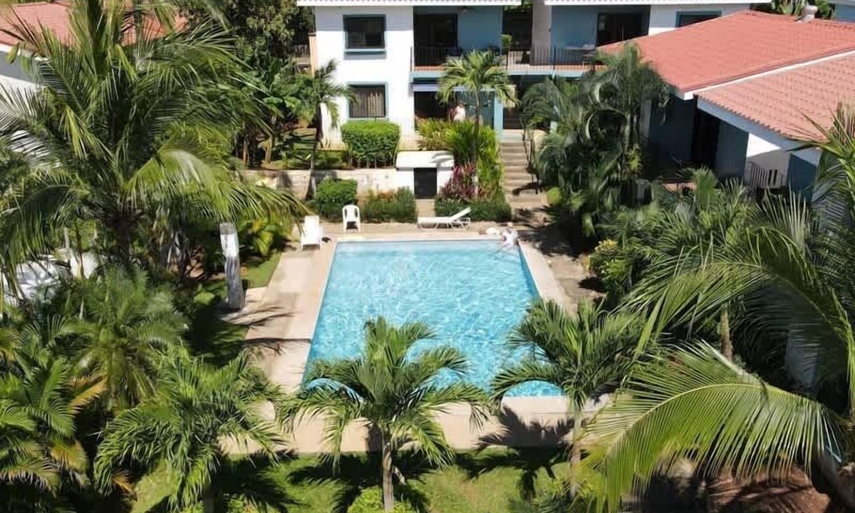 Coco Apartment | Minimalist Condo with a Beautiful New Design, Enclosed Patio, and Shared Community Pool