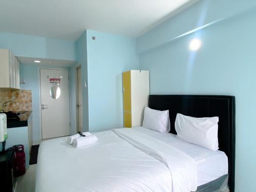 Karawang Apartment | Minimalist Studio Grand Sentraland Karawang Apartment By Travelio