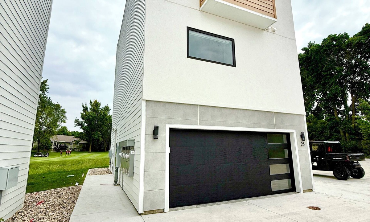 Arnolds Park Condo | Modern 3-Story Condo Across from Arnold’s Park – Walk to Fun, Lake, & Dining!