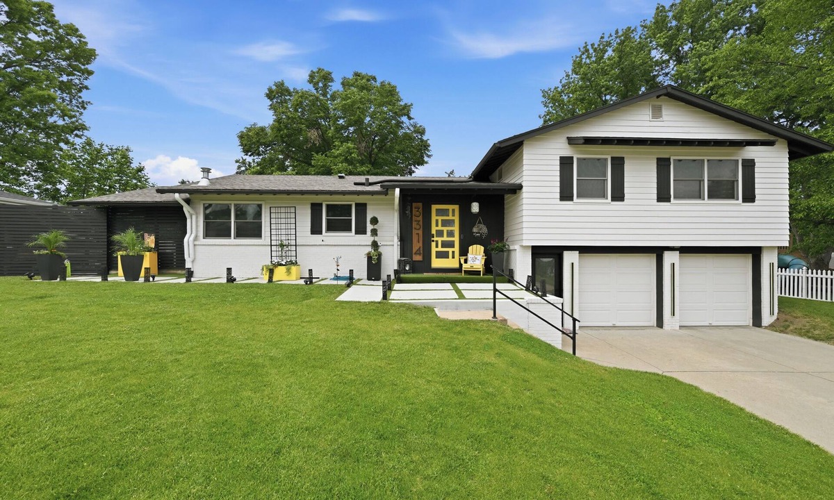 South Central Omaha House | Modern 4-bedroom Bee Hive with open floor plan & easy access to the interstate.