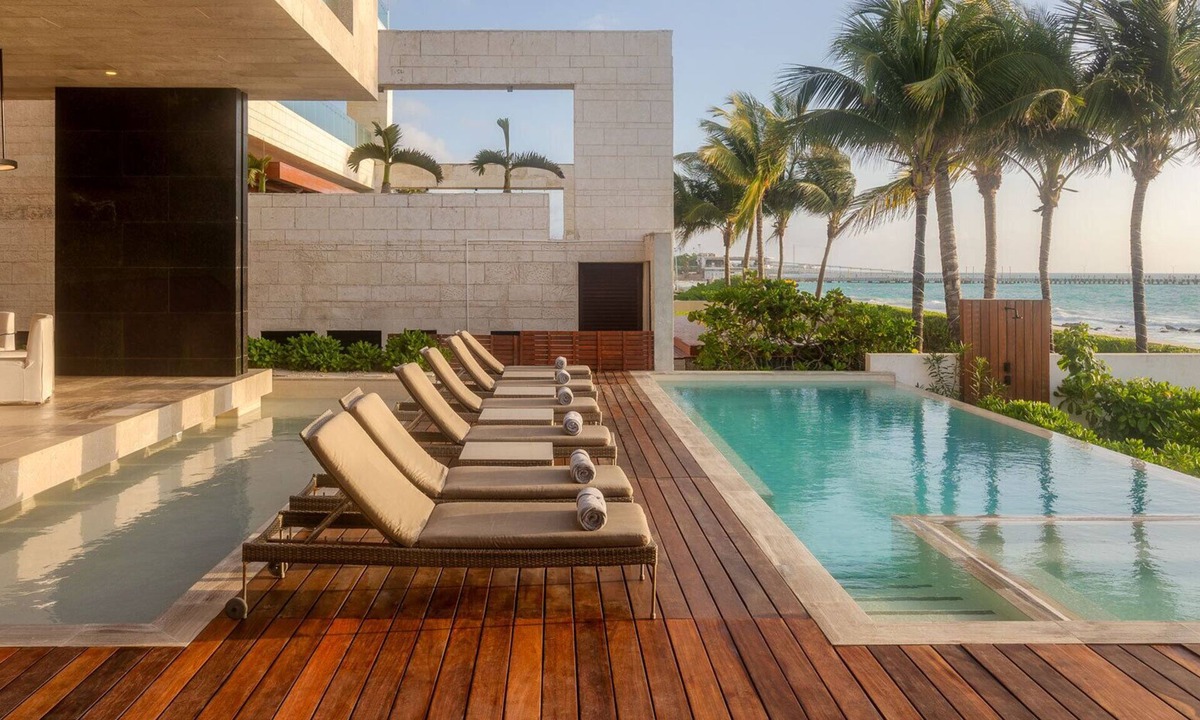 Centro Villa | Modern 7 bed, beachfront masterpiece close to town!