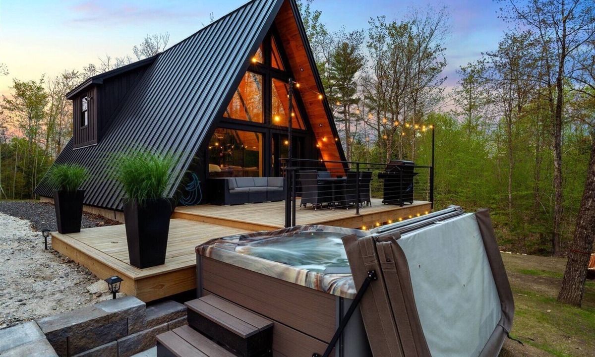 Sebago House | Modern A-frame house with hot tub and fire pit. Very private!