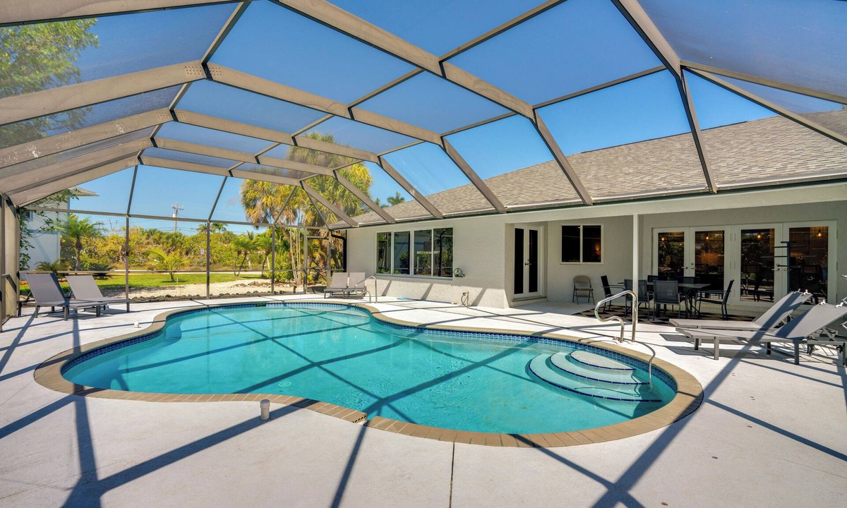 Shell Harbor House | Modern Canal-Front Gem w/Lanai + Dock in Sanibel