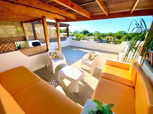 Coco Sunset Hills House | Modern Condo with a Rooftop Patio