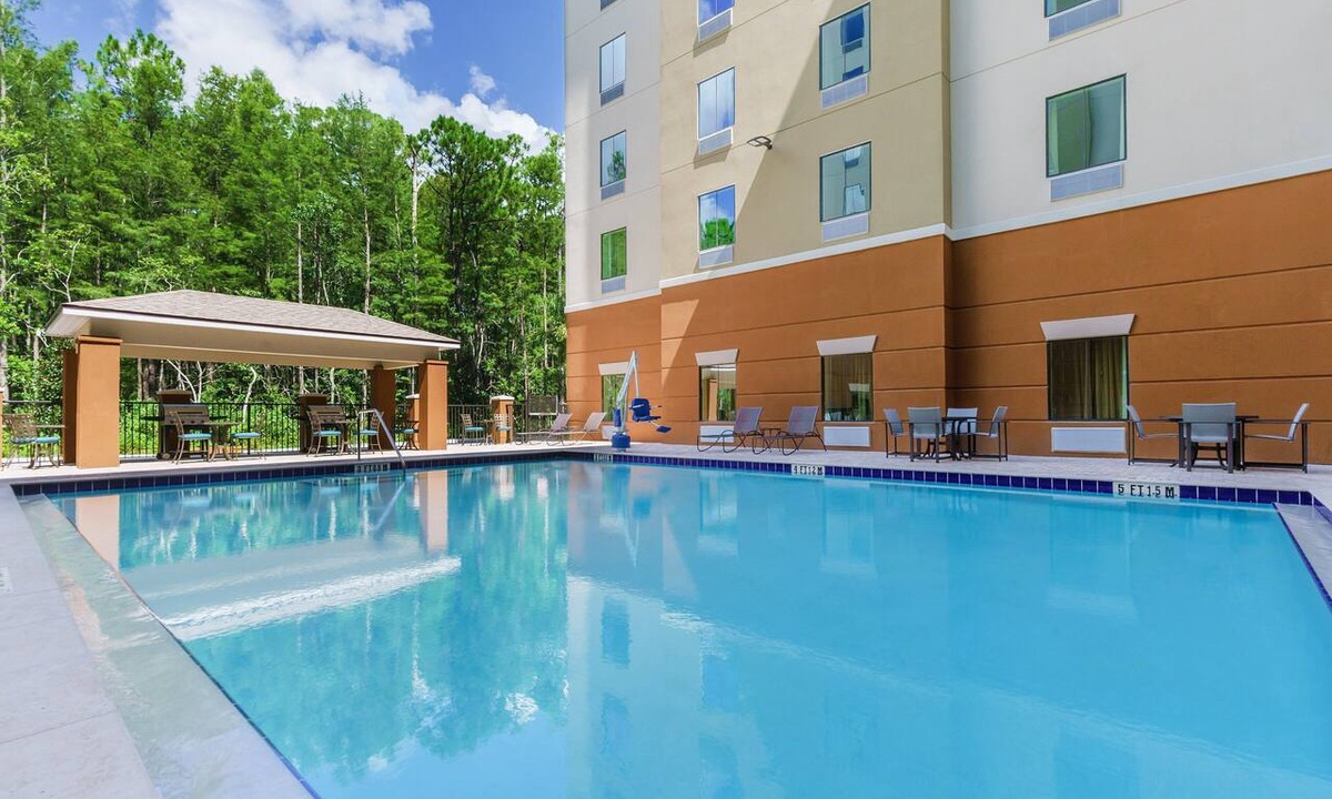 Florida Central Atlantic Coast Hotel | Modern Double Queen Studio | Kitchen & Grill | 3 mi to Typhoon Lagoon