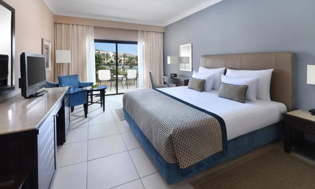 Village Road Resort | Modern Family Resort Living with Aqua Fun & 4 Spacious Rooms with Pool View