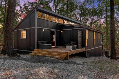 The Woods House | Modern Forest Cabin with Hot Tub, Screened Porch & Resort Access Near Hedgesville, WV