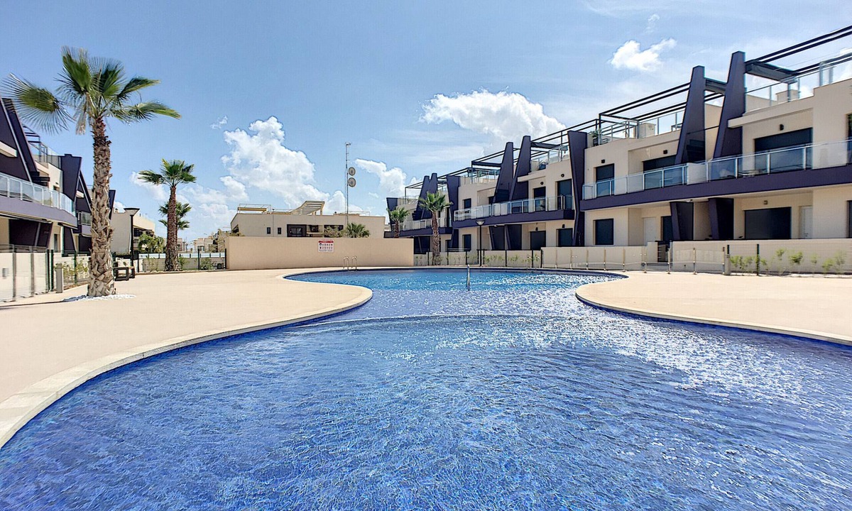 Pueblo Latino Apartment | Modern ground floor, wifi, patio, 2 pools