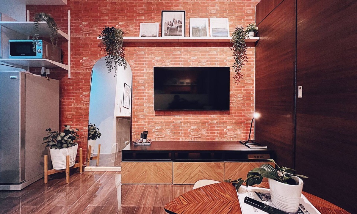 San Antonio Condo | Modern rustic 1-BR condo with balcony at Air Residences Makati