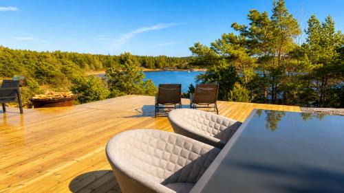 Stromstad House | Modern Scandinavian cabin by the sea, calm, private setting, 50m to ocean