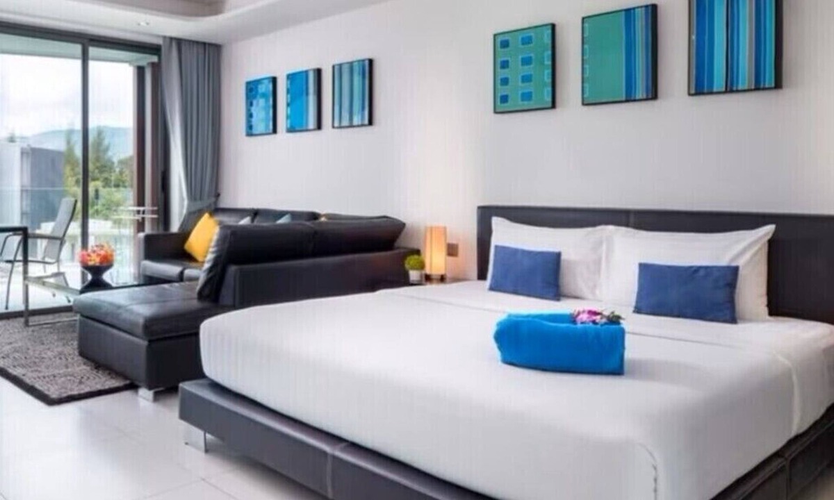 Patong Resort | Modern Studio Condo with access to gym and infinity pools.