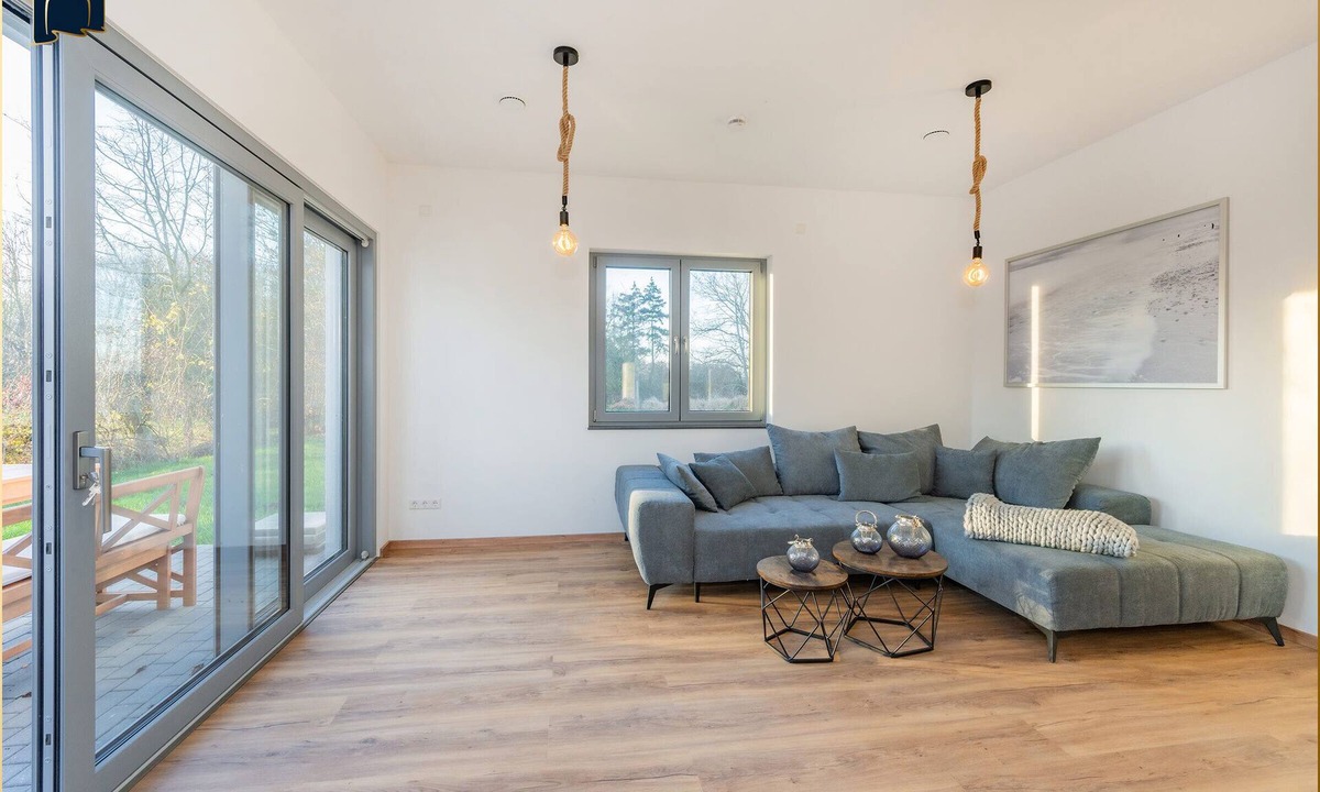 Usedom House | Modern vacation home "Haffhus" for up to 10 people with garden and balcony
