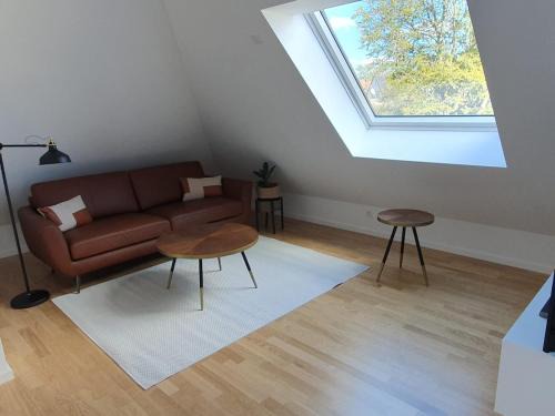 Thalkirchen - Obersendling - Forstenried - Furstenried - Solln Apartment | Moderne Dachgeschosswohnung in exklusiver Villa