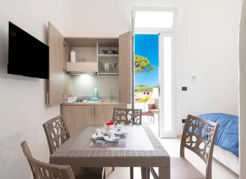 Boncore House | Monolocale Vela Nuovo con Wi-Fi, Clima e Giardino a Torre Lapillo