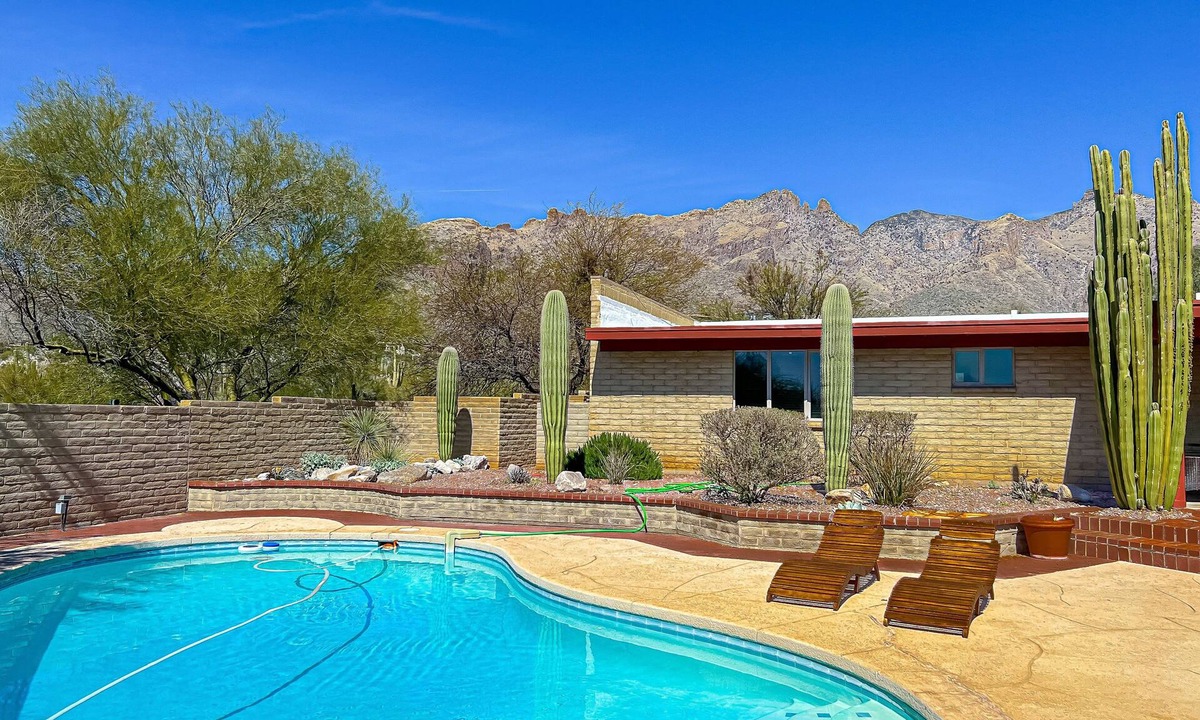 The Foothills House | Mountain view escape with an enclosed yard, pool, hot tub, grill, & AC - dogs ok