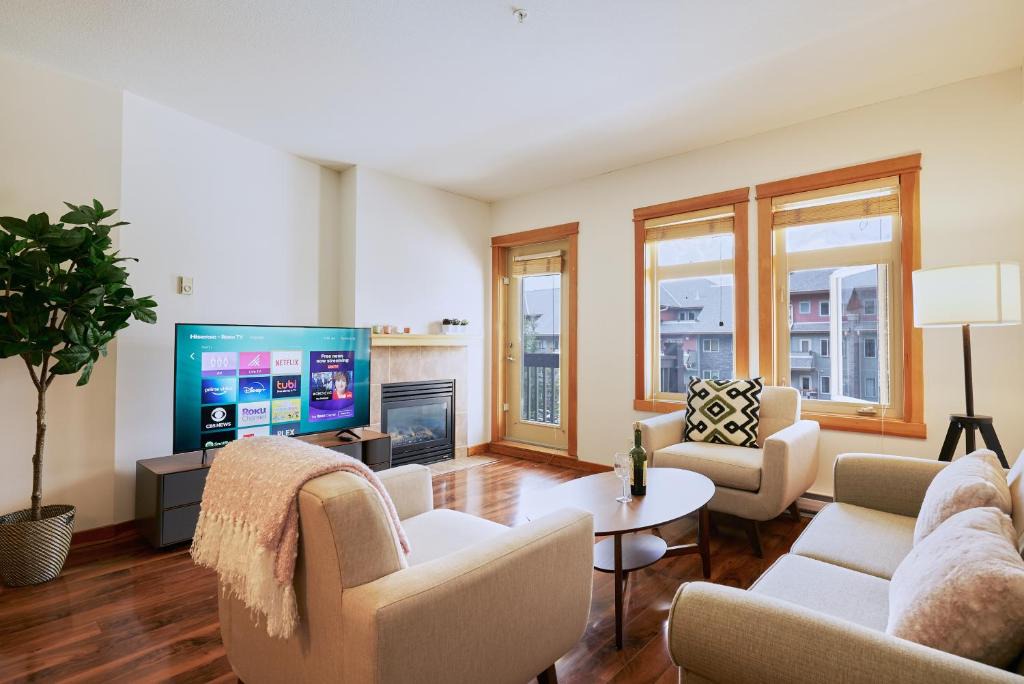 Canmore Apartment | Mtn View Escape with King Size Bed with Outdoor Pool - Banff Pass Included!