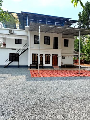 Thalassery House | Nariman's riverstone hevan Resort