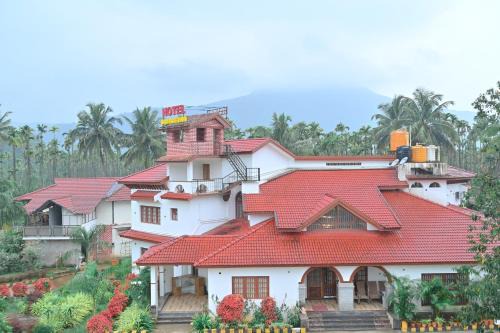 Koppa Hotel | NAVARATHNA International resort