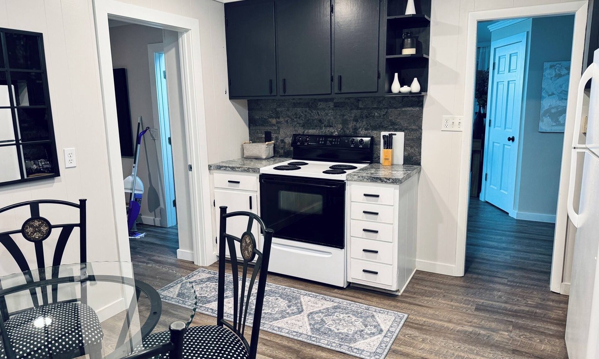 Interlochen Cottage | New~Enchanting modern cottage tucked away in the trees. Heavenly Kingsize Bed