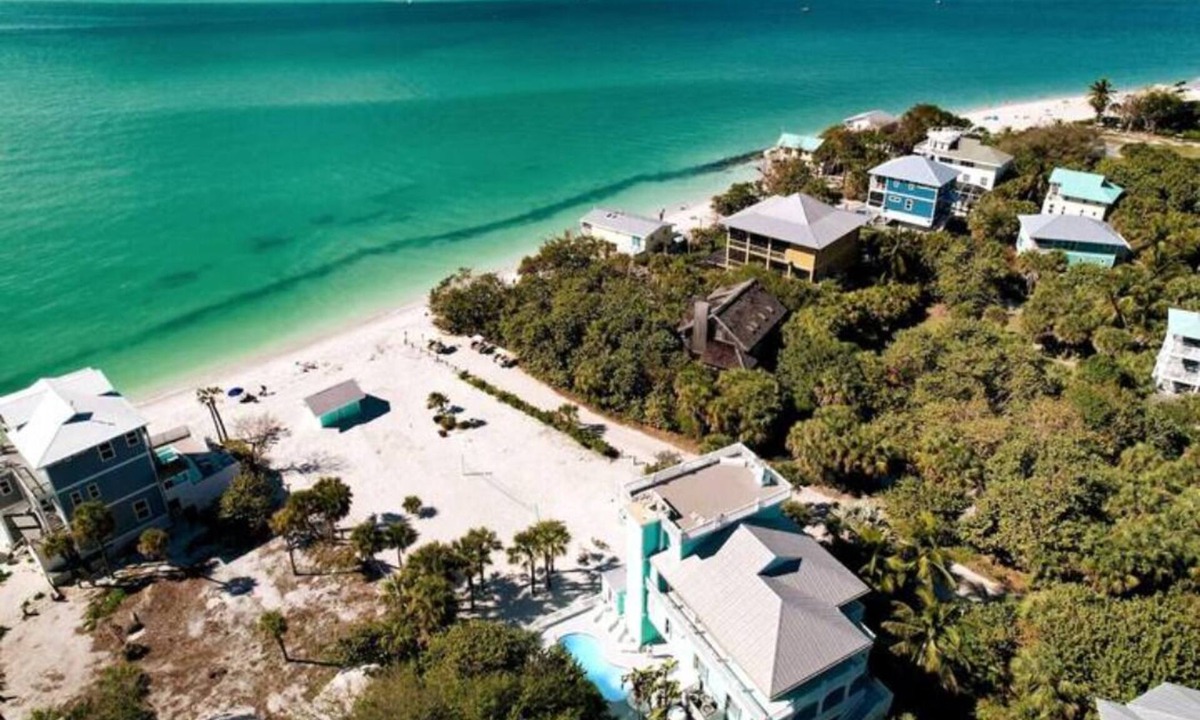 North Captiva House | NEW LISTING! OCEAN PARADISE: BEACHFRONT, SLEEPS 12, 2 CARTS, POOL, GAMES, & FUN