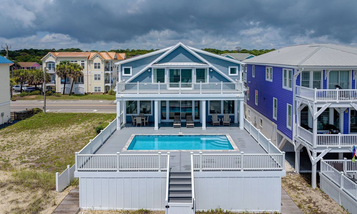 Kure Beach House | NEW! Ocean Front luxurious 6 bedroom home Pool, Elevator, and on the Beach!