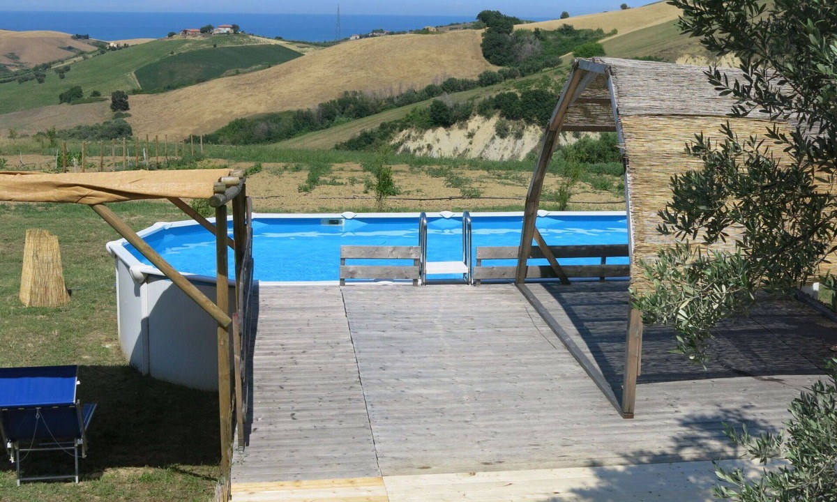 Cologna Spiaggia Villa | Nice apartment in villa with hot tub, pool, A/C, WIFI, TV, patio, pets allowed and panoramic view