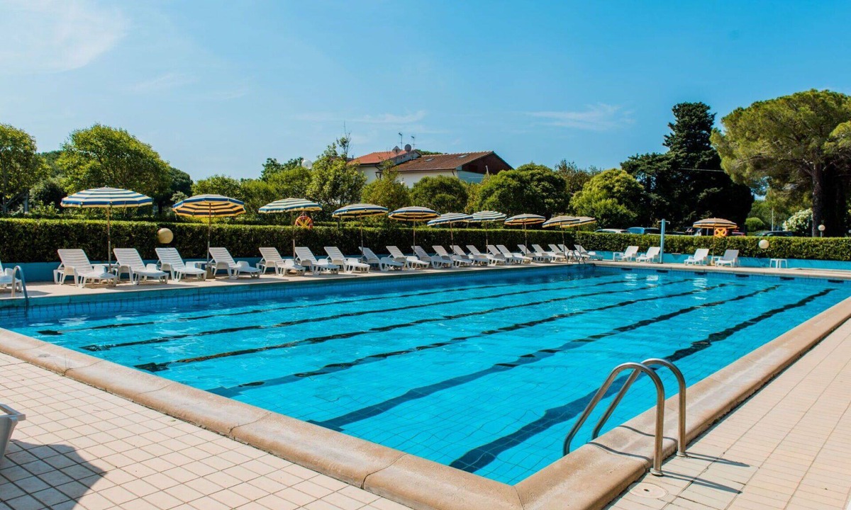 Marina di Bibbona Apartment | Nice apartment for 4 people with pool, A/C, WIFI, TV, terrace and pets allowed