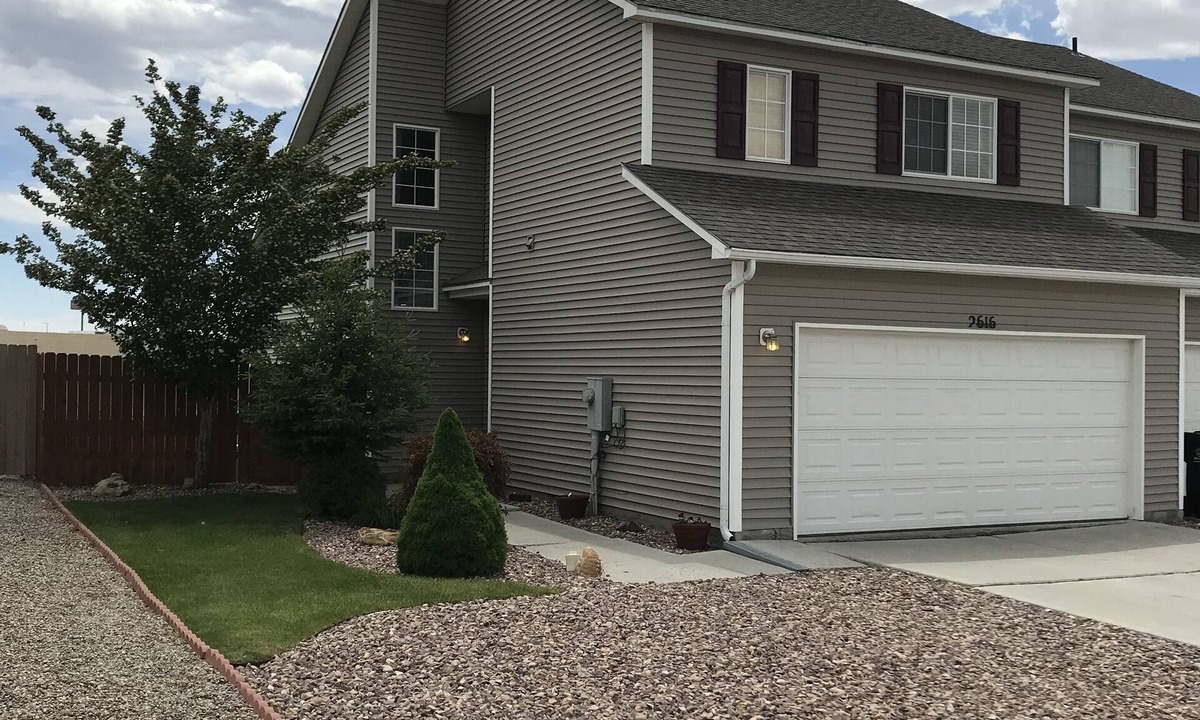 Rock Springs House | Nice, quiet townhouse with garage. Nicely landscaped and fenced in backyard.