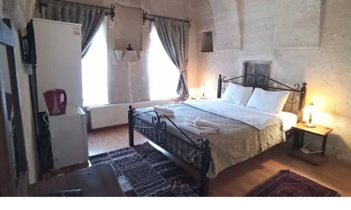 Goreme House | Nomads - Traditional Arch Stone room at the center