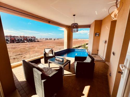Cherrat Apartment | Ocean Gem - Exclusive 2BR, Balcony Pool, Beach, Surf & Views