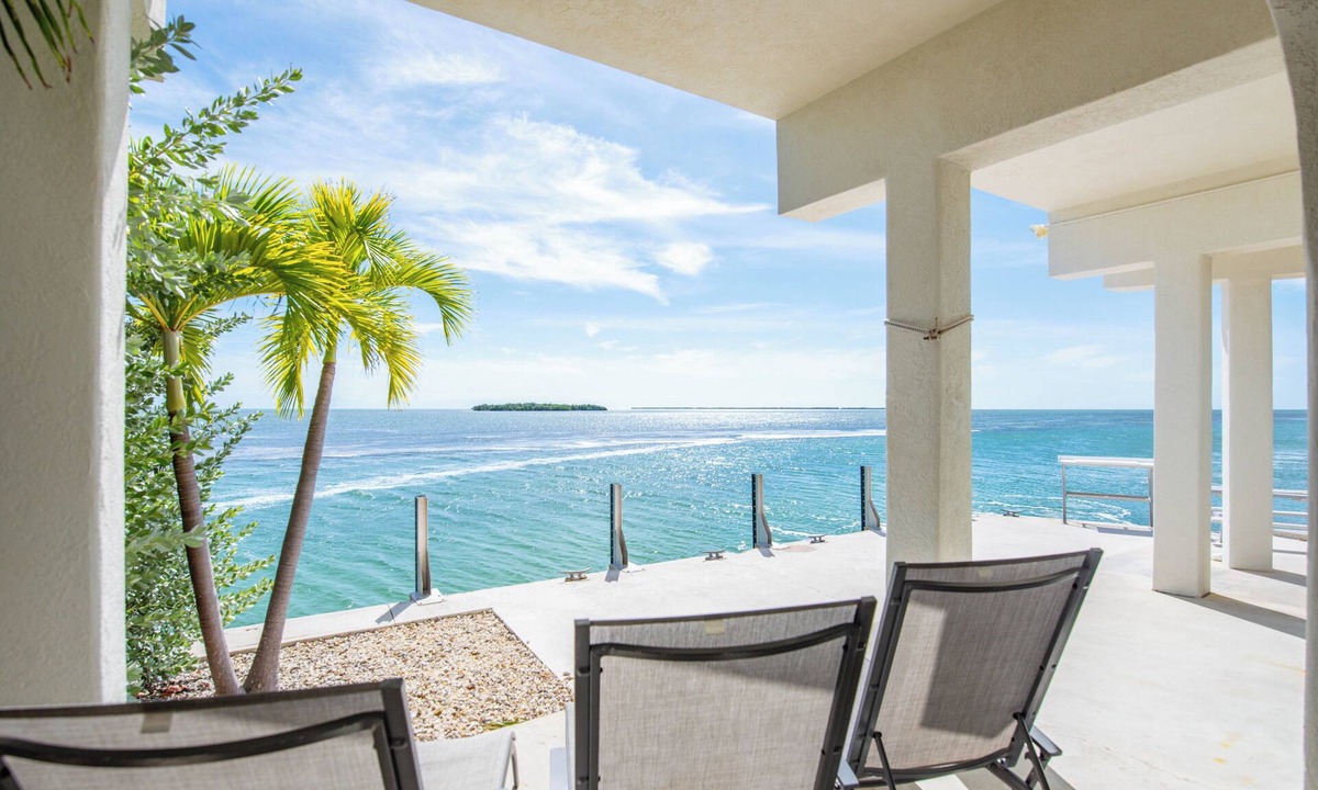 Cudjoe Key House | Open-water home with stunning views, 42' seawall for 40' boat, modern updates, large balcony