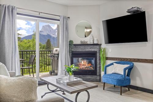 Canmore Apartment | Outstanding Mountain Condo - Pool, Hot Tub & Waterslide!