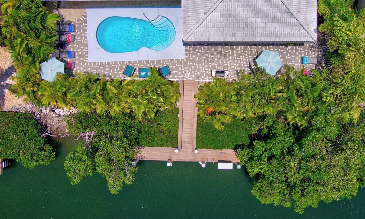 Coury House | P27 - Private Beach Access! Pool home with everything you need for an unforgettable vacation. 3 bedroom 2 baths with deep water dockage.