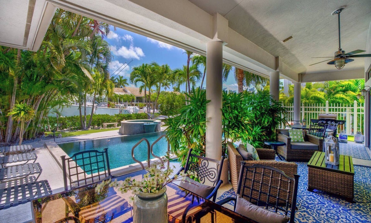 Coury House | P28 - Luxury 4 bedroom, single family home with pool and dock in Key Colony Beach