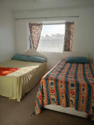 Papamoa Beach House | Papamoa shared holiday accommodation