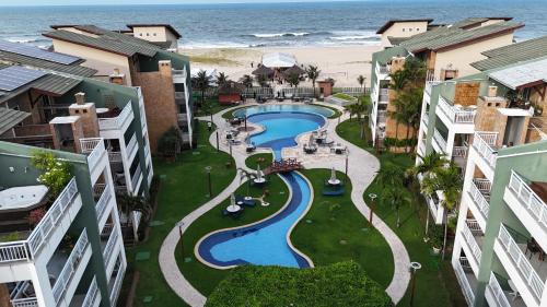 Porto das Dunas Apartment | Paraíso Beach - Terramaris - Apartamento frente mar, pé na areia, próximo ao Beach Park